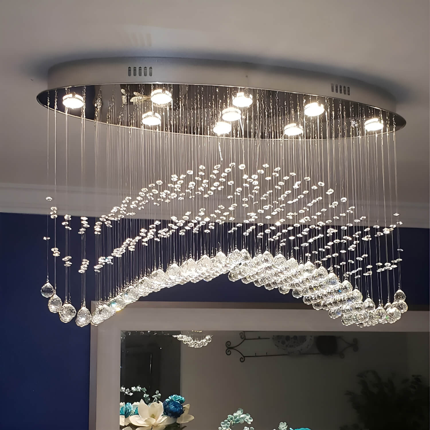 https://www.sofary.com/cdn/shop/files/modern-wave-rain-drop-clear-crystal-chandelier-oval-ceiling-light-2.jpg?v=1702867534&width=1500